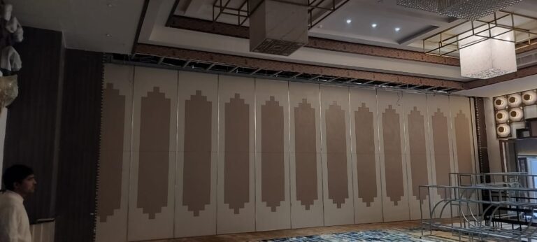 Wooden sliding partition installation at Deepti Courtyard luxury hotel banquet hall in Rourkela