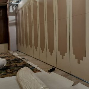 Wooden sliding partition installation at Deepti Courtyard luxury hotel banquet hall in Rourkela