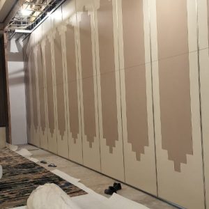 Wooden sliding partition installation at Deepti Courtyard luxury hotel banquet hall in Rourkela